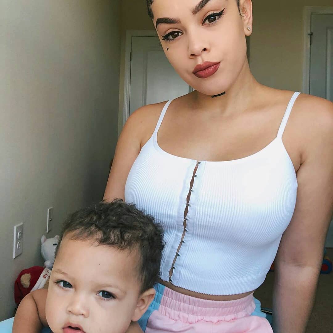 A softly lit silhouette of a young child at play, symbolizing early childhood and privacy.