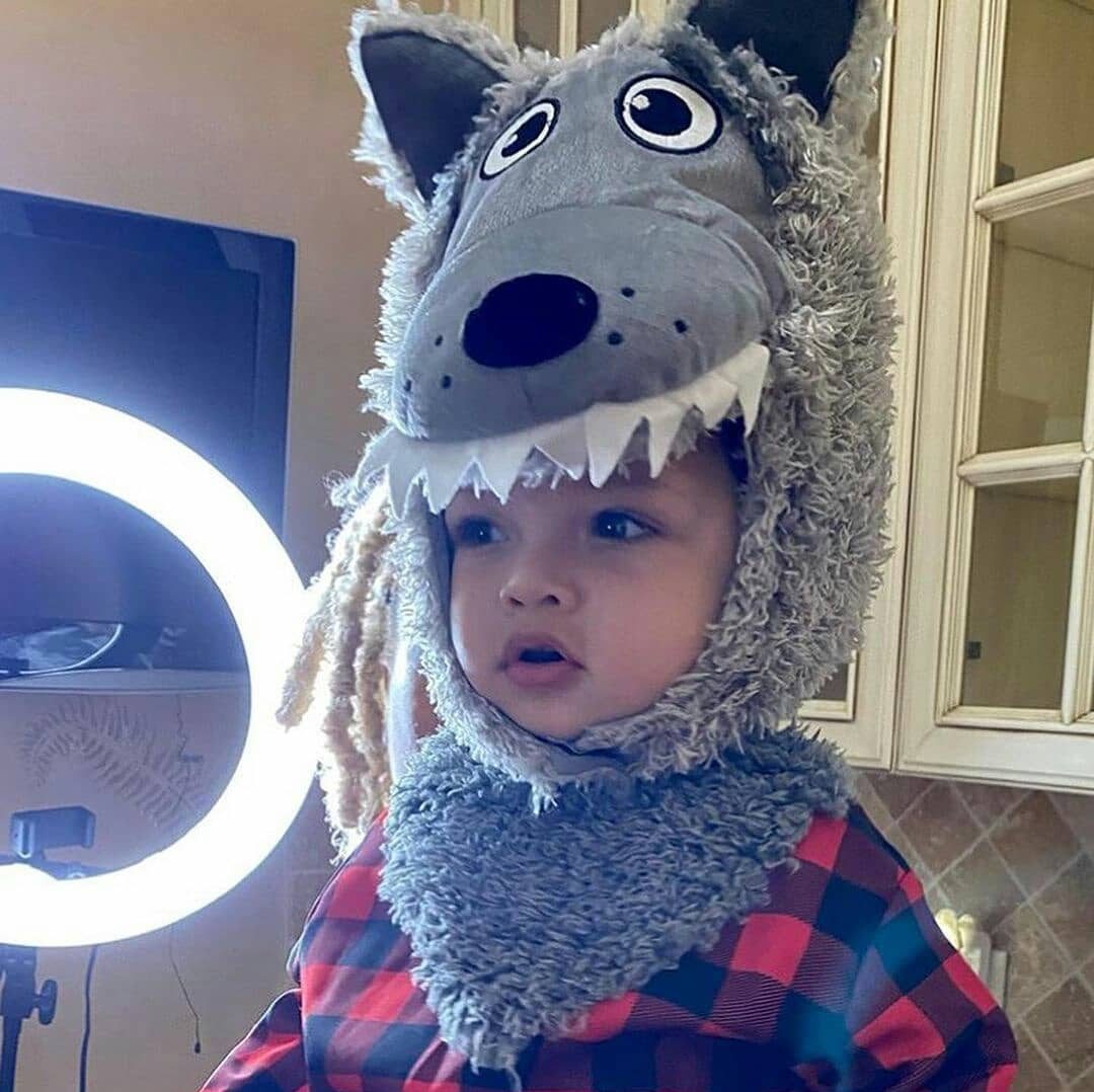 A softly lit silhouette of a young child at play, symbolizing early childhood and privacy.