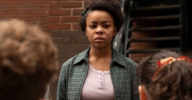 Young actress Amanda Christine smiling during a quiet moment on set