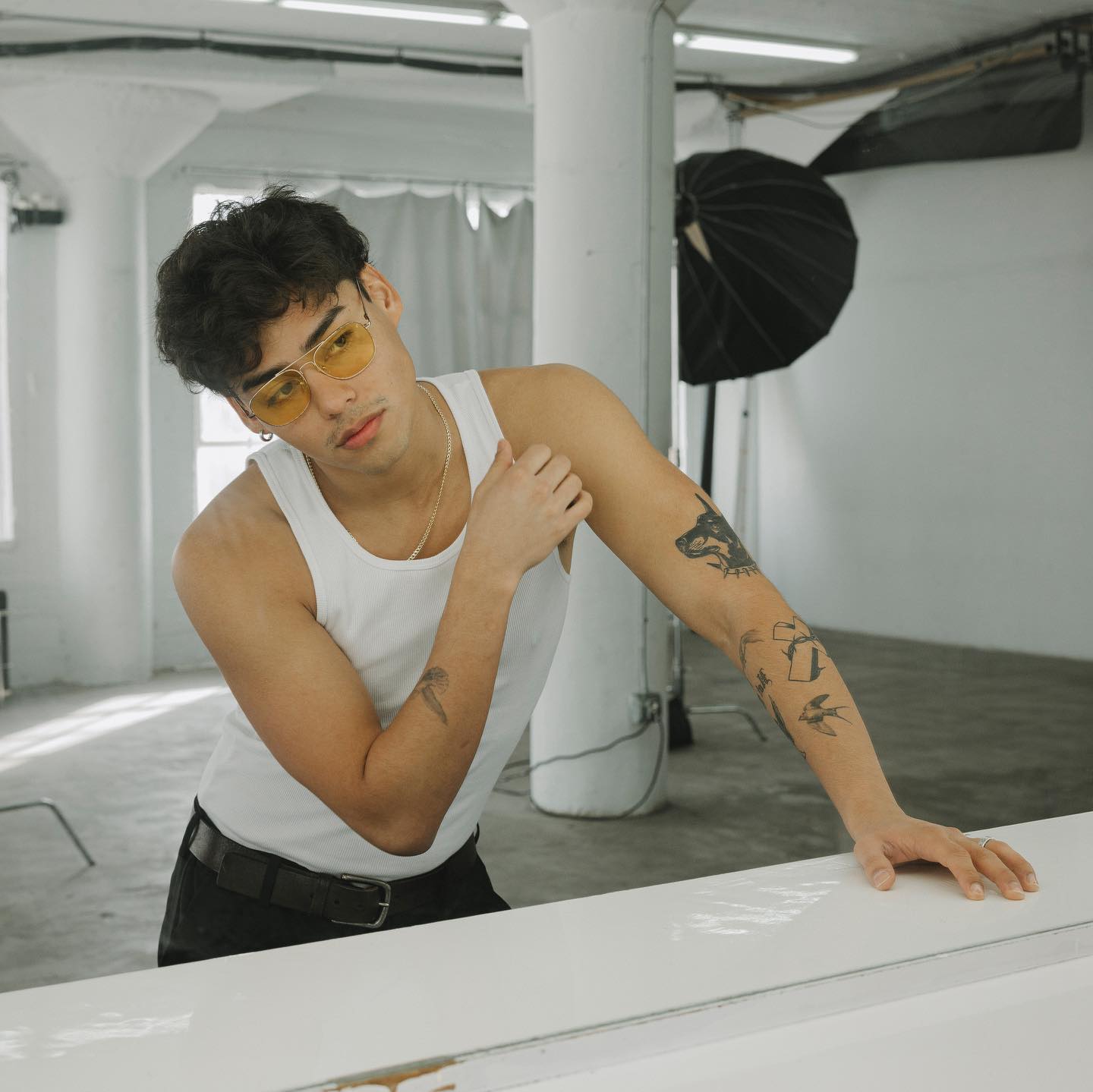 Andrew Davila in a relaxed pose, casual outfit, natural lighting, conveying an approachable and authentic style.