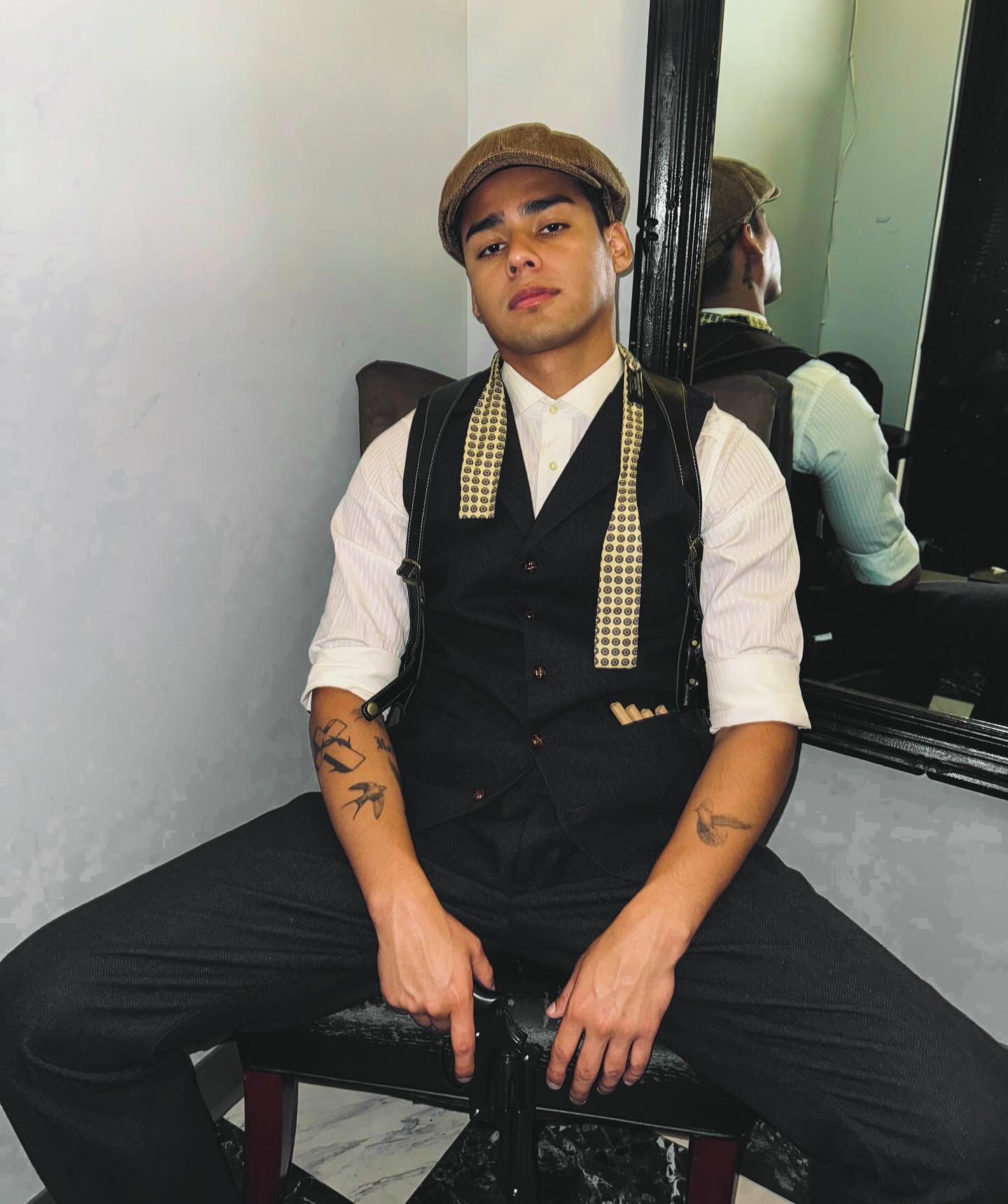 Andrew Davila in a relaxed pose, casual outfit, natural lighting, conveying an approachable and authentic style.