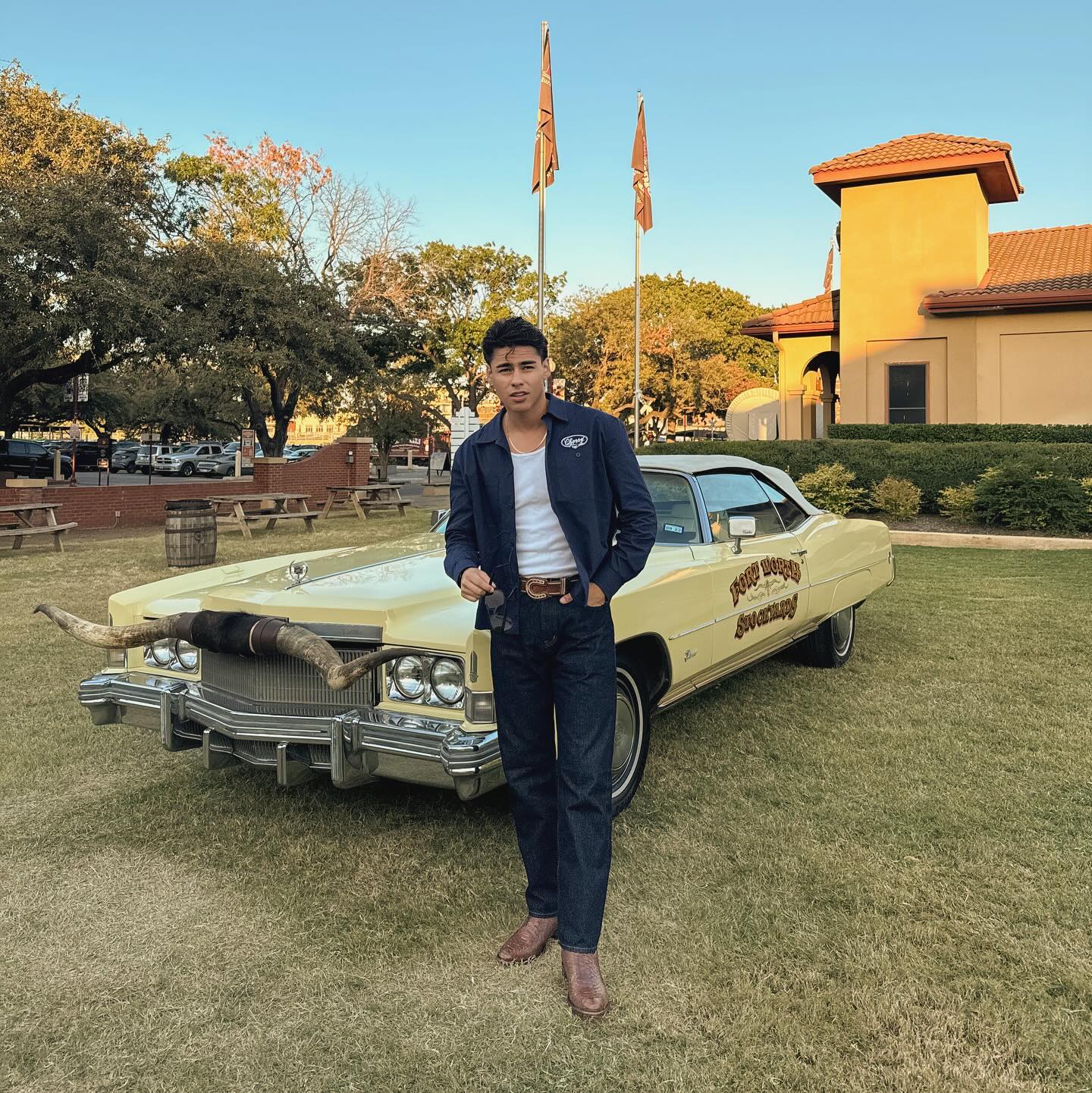 Andrew Davila in a relaxed pose, casual outfit, natural lighting, conveying an approachable and authentic style.