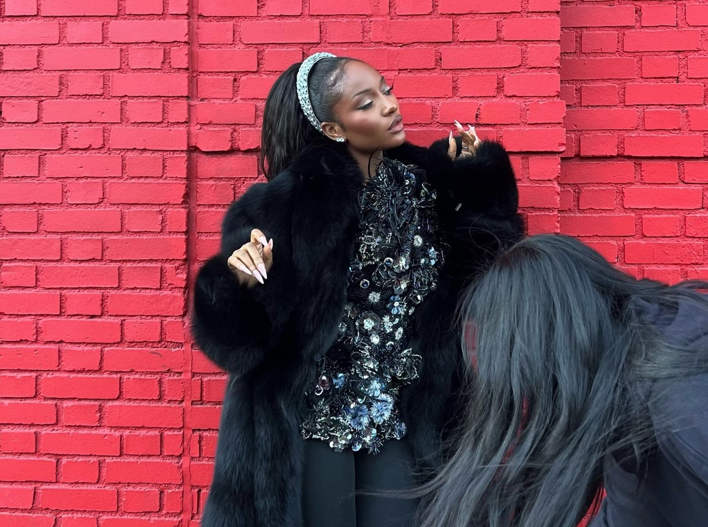 Ayra Starr performing on stage with confident energy and expressive vocals