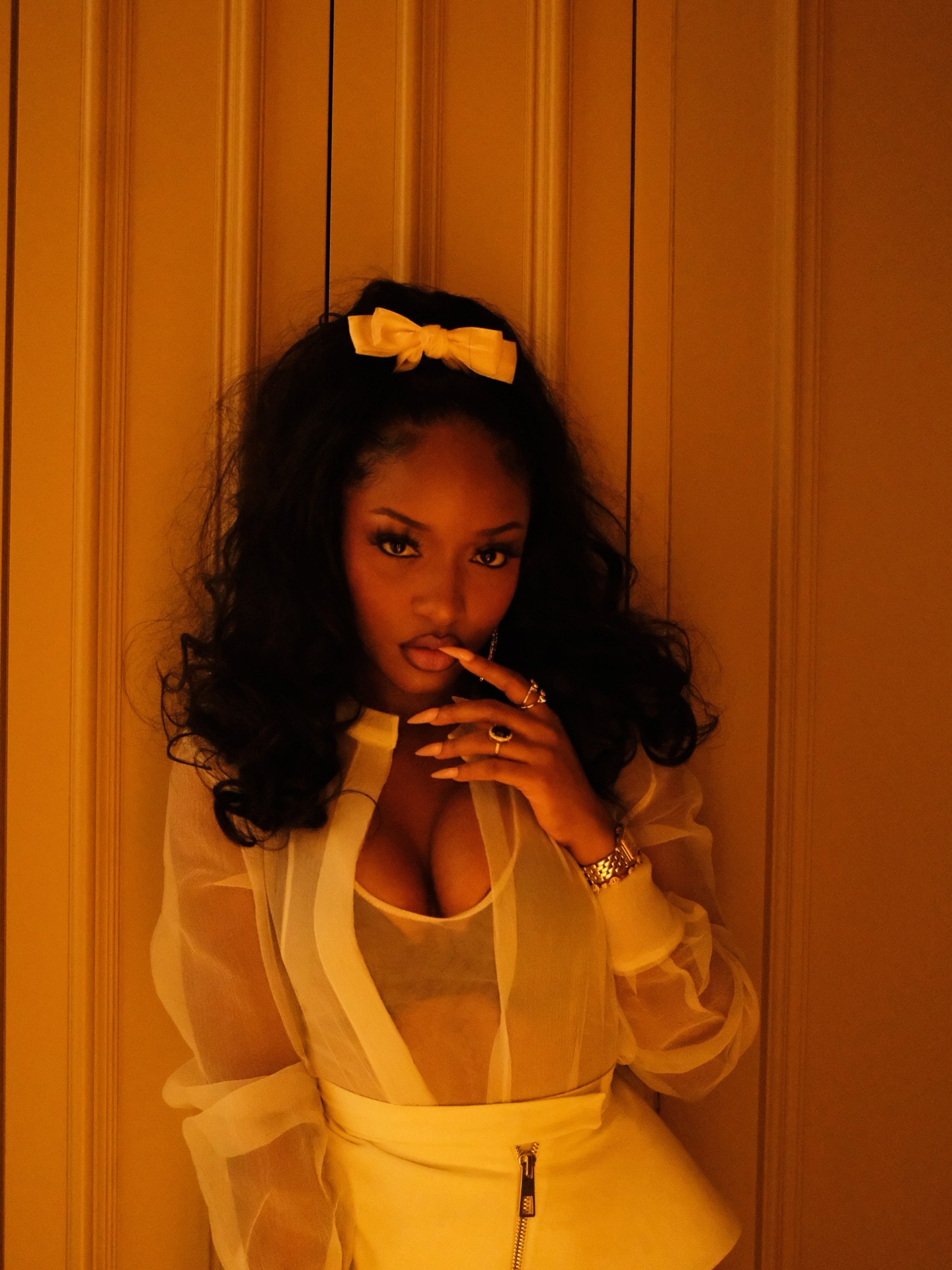 Ayra Starr performing on stage with confident energy and expressive vocals