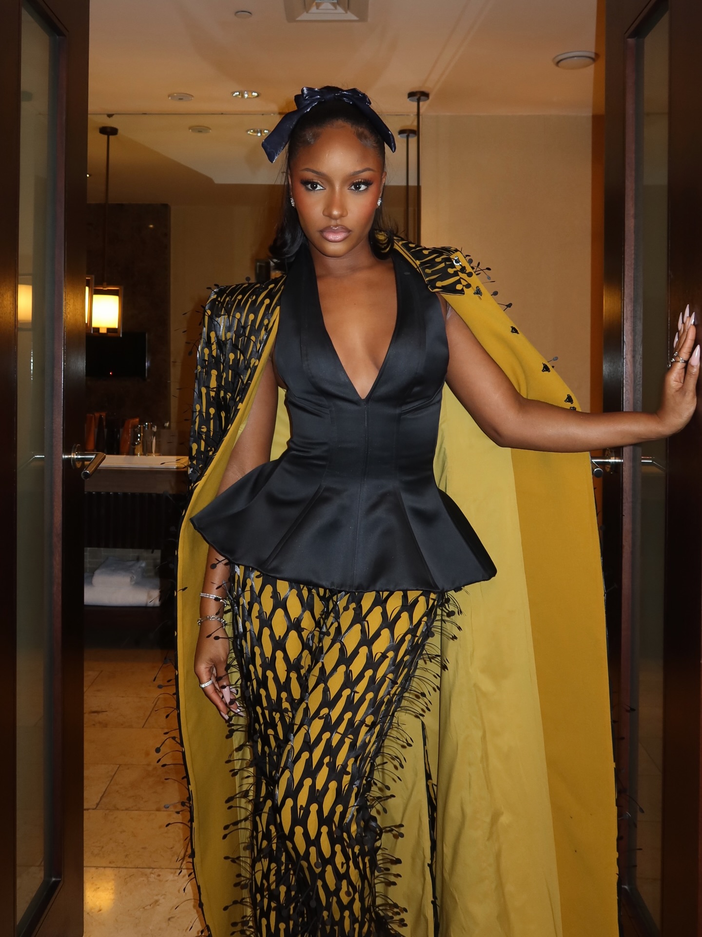 Ayra Starr performing on stage with confident energy and expressive vocals