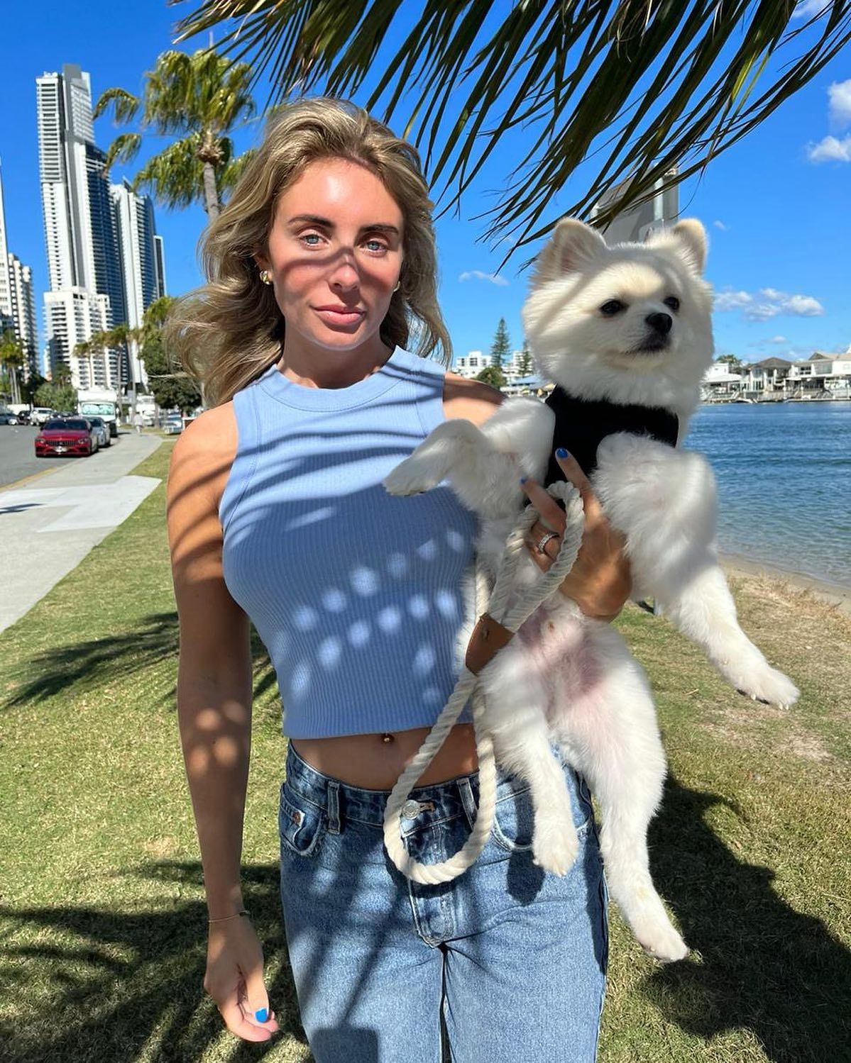 Bonnie Blue sharing a candid, sunlit moment that reflects her relaxed lifestyle aesthetic and mid-twenties confidence