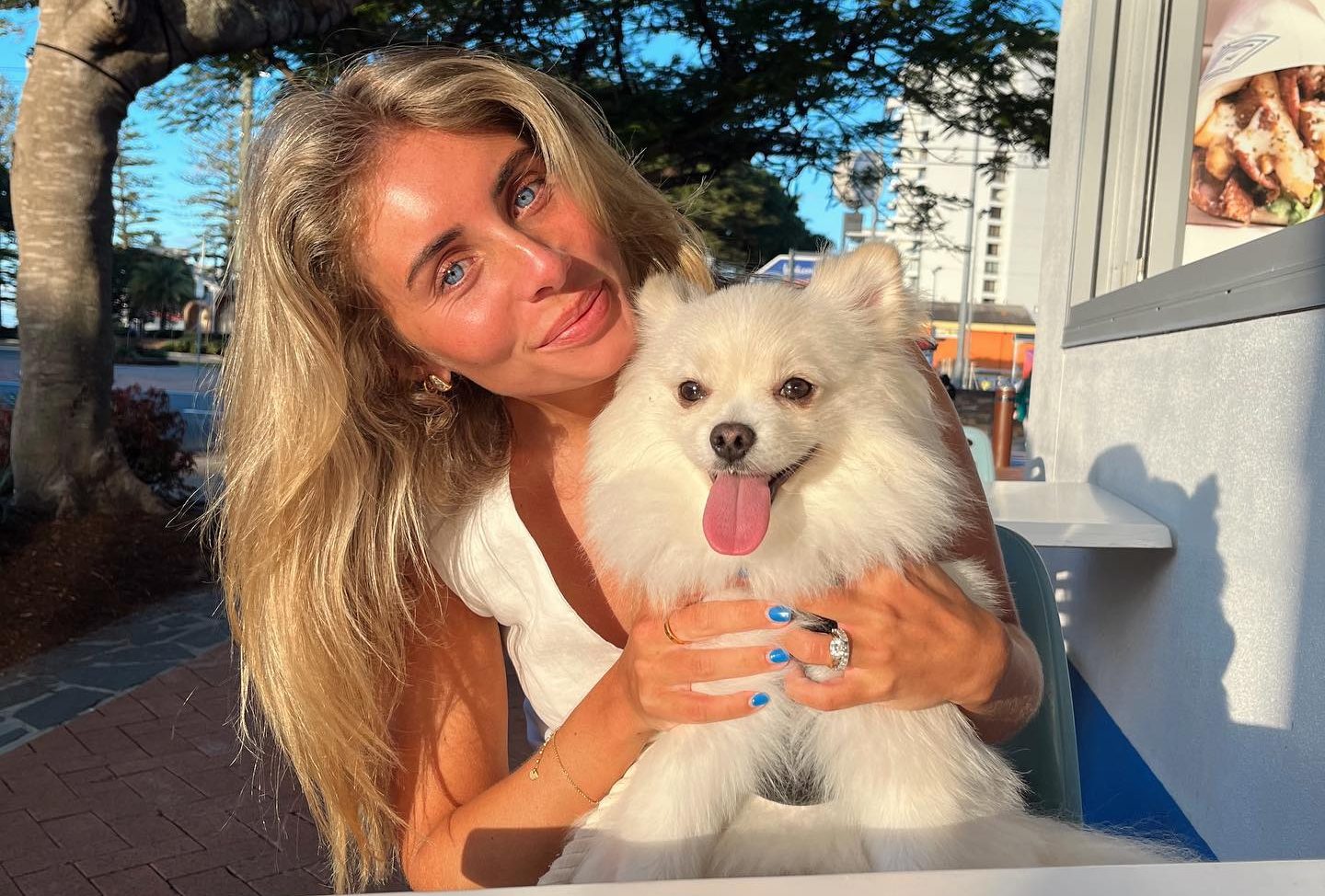 Bonnie Blue sharing a candid, sunlit moment that reflects her relaxed lifestyle aesthetic and mid-twenties confidence