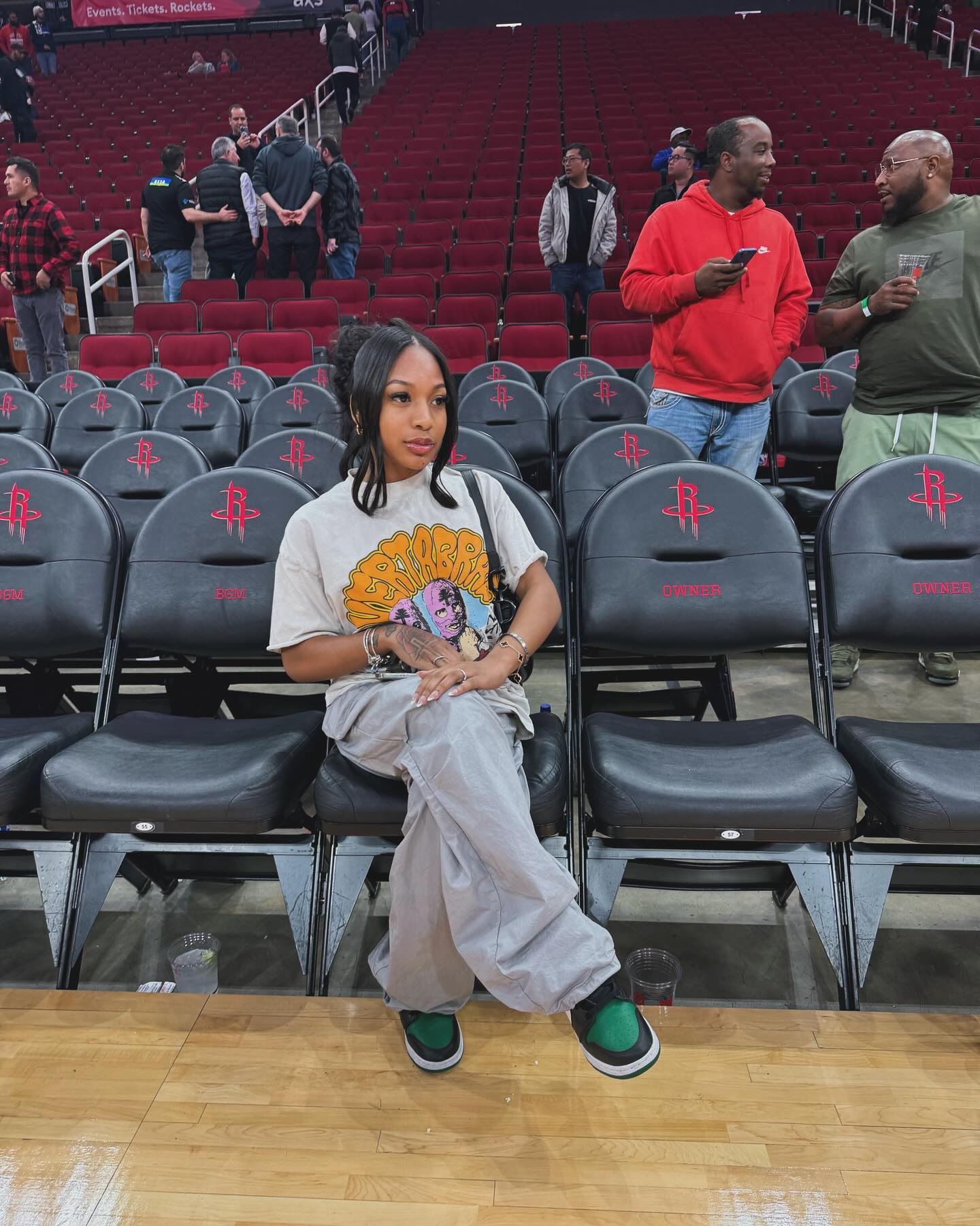 Brooklyn Frost smiling while filming a casual vlog at home, conveying a playful and confident on-camera presence