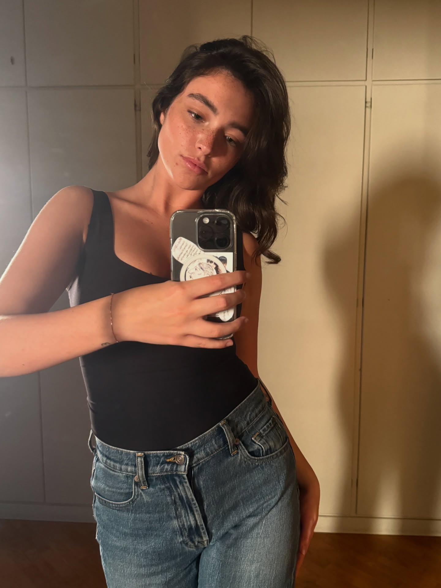 Gio Scotti performing a lip sync on camera with expressive gestures and a clean, minimalist background