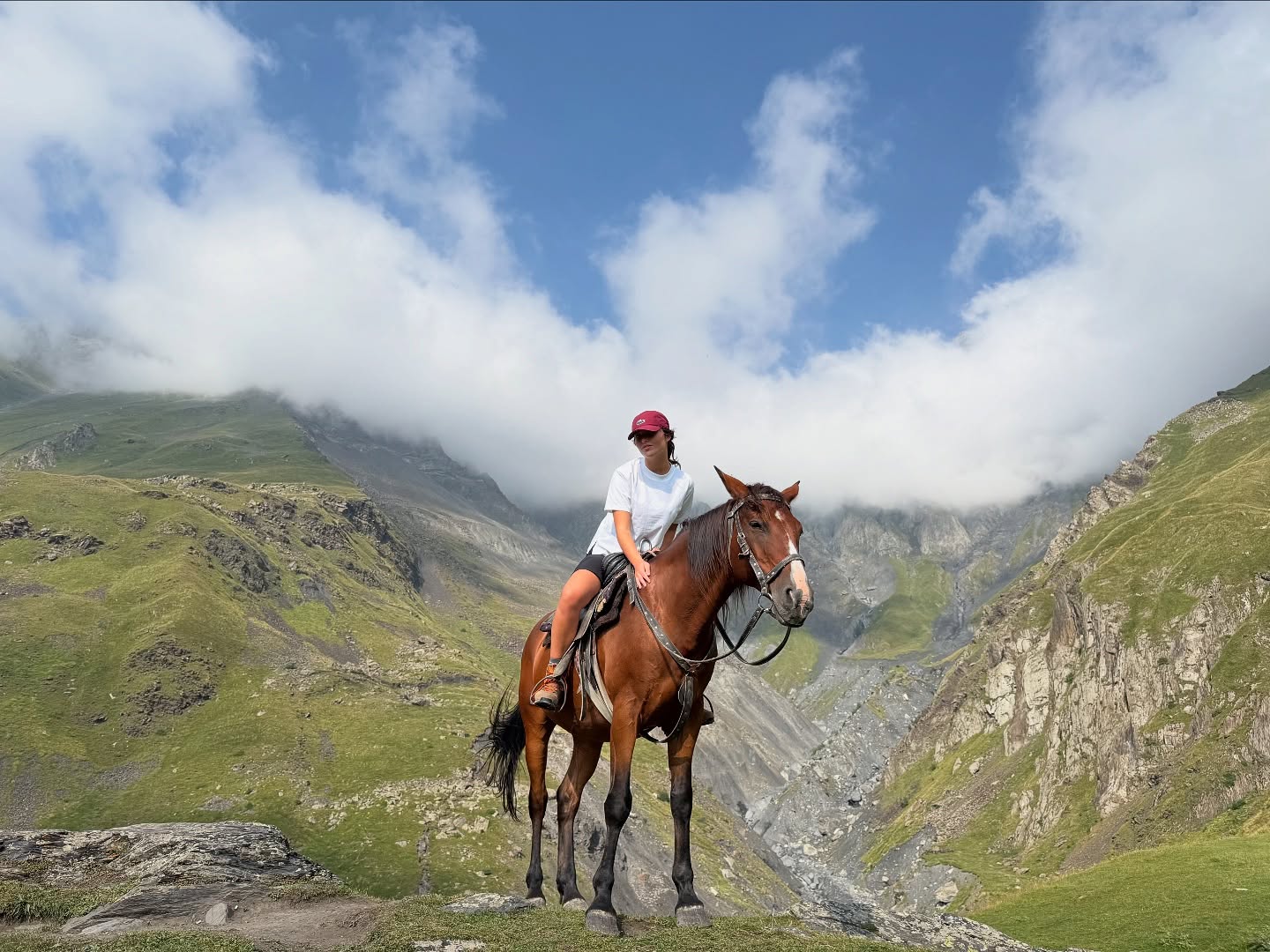 Gio Scotti performing a lip sync on camera with expressive gestures and a clean, minimalist background