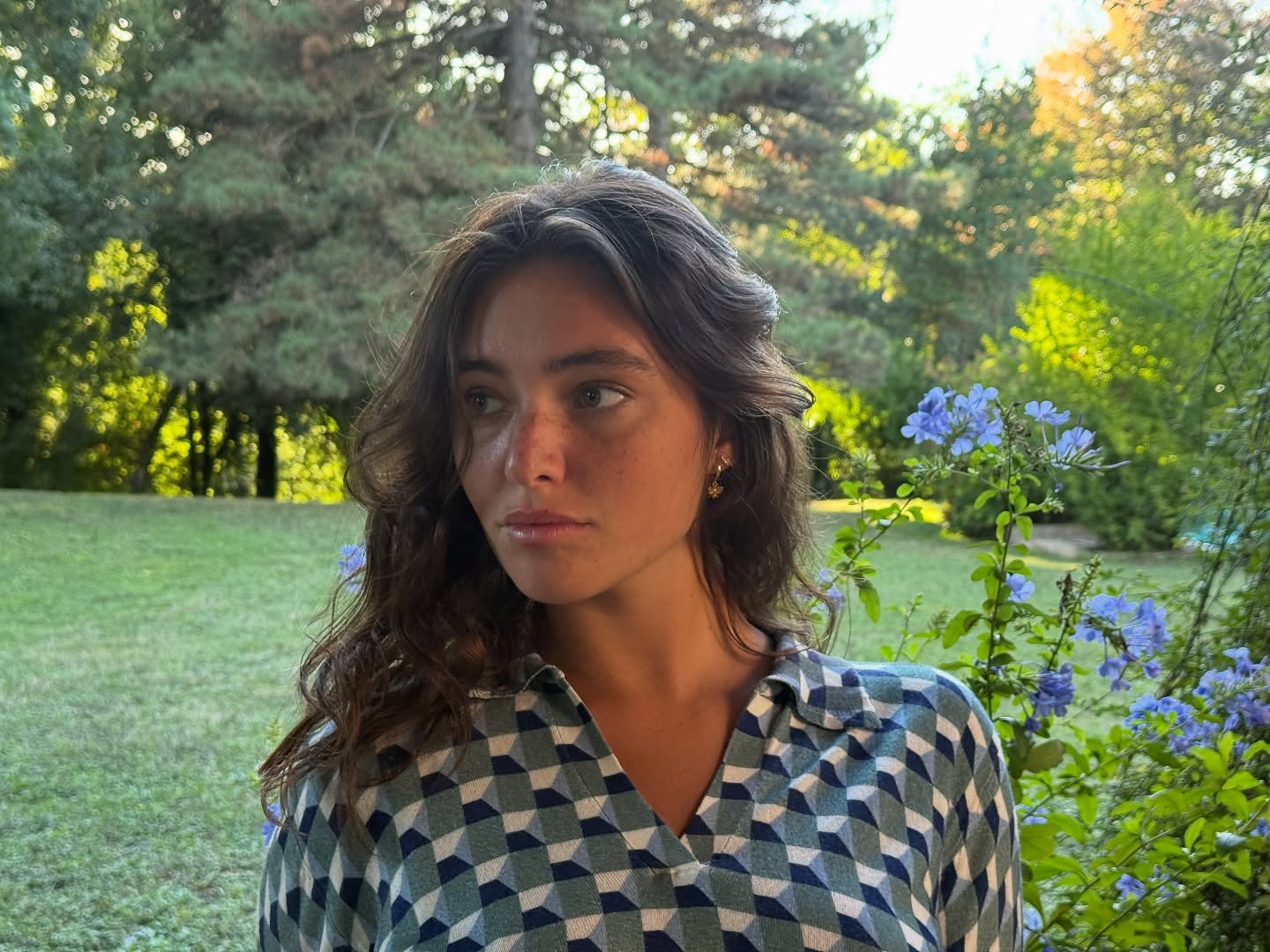 Gio Scotti performing a lip sync on camera with expressive gestures and a clean, minimalist background