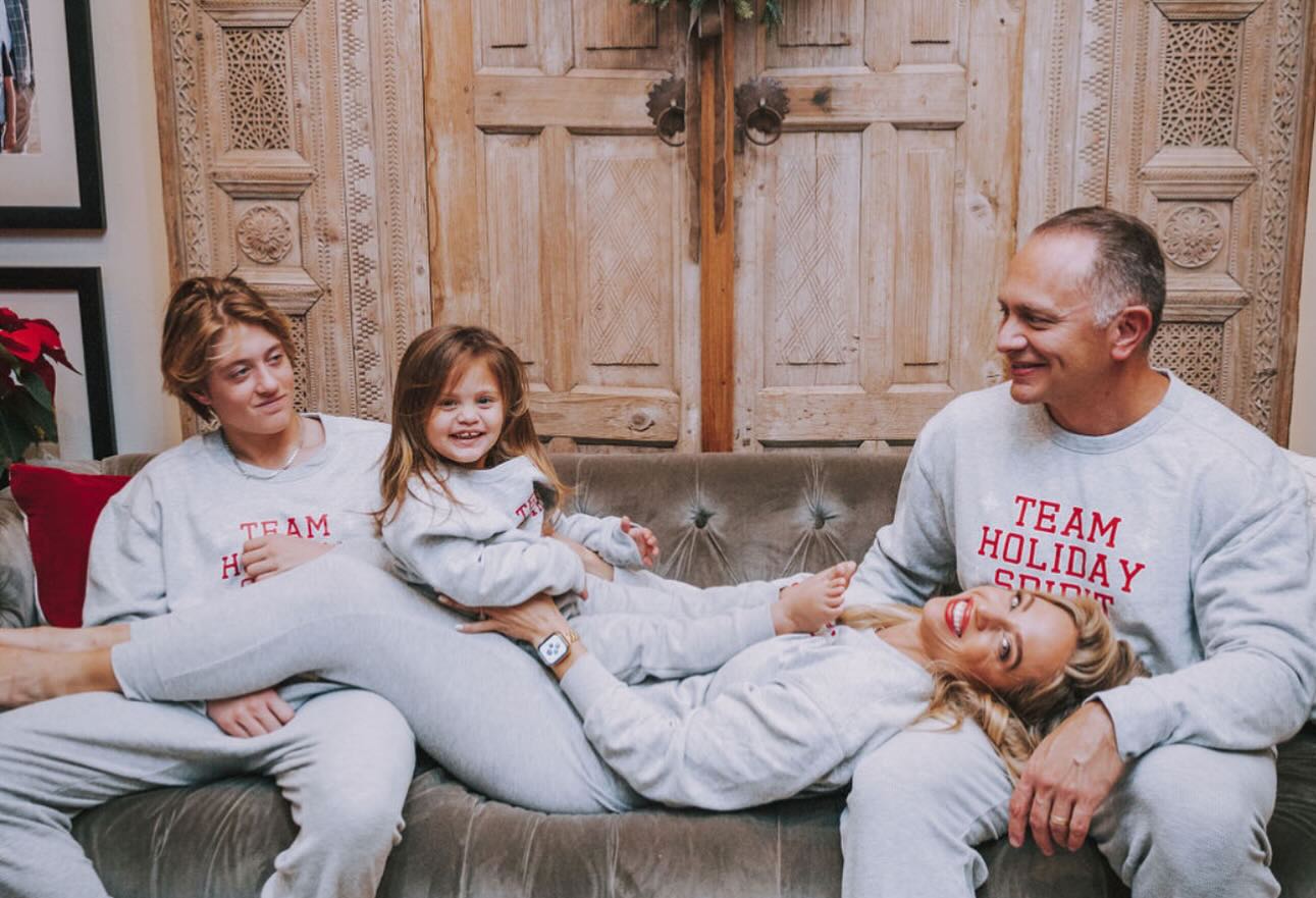 Ashley Trevino recording a casual TikTok selfie at home, conveying confidence and a relaxed lifestyle vibe