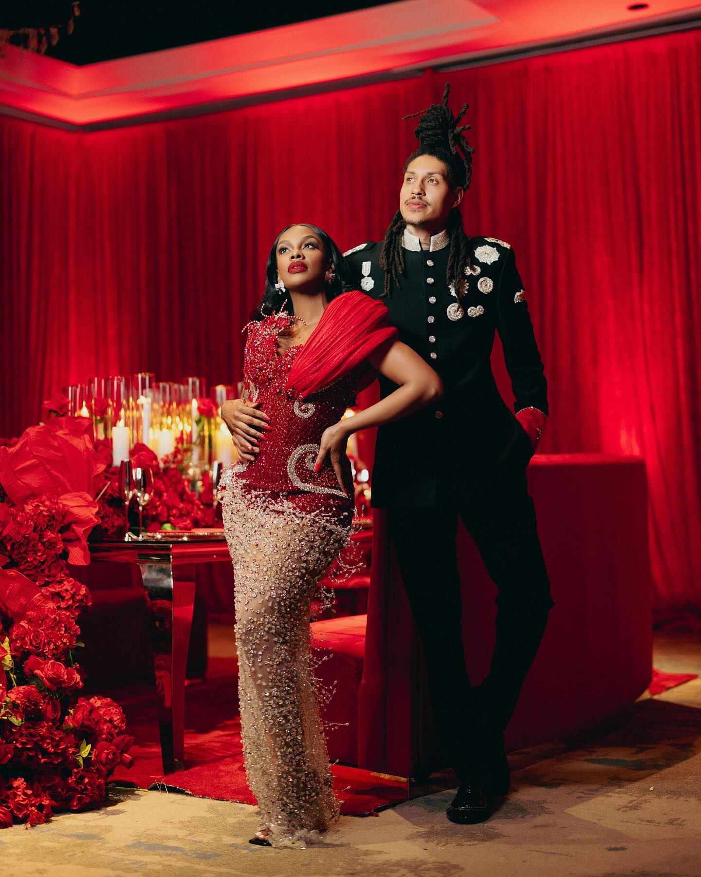 Jess Hilarious performing on stage, delivering a high energy set with expressive gestures.