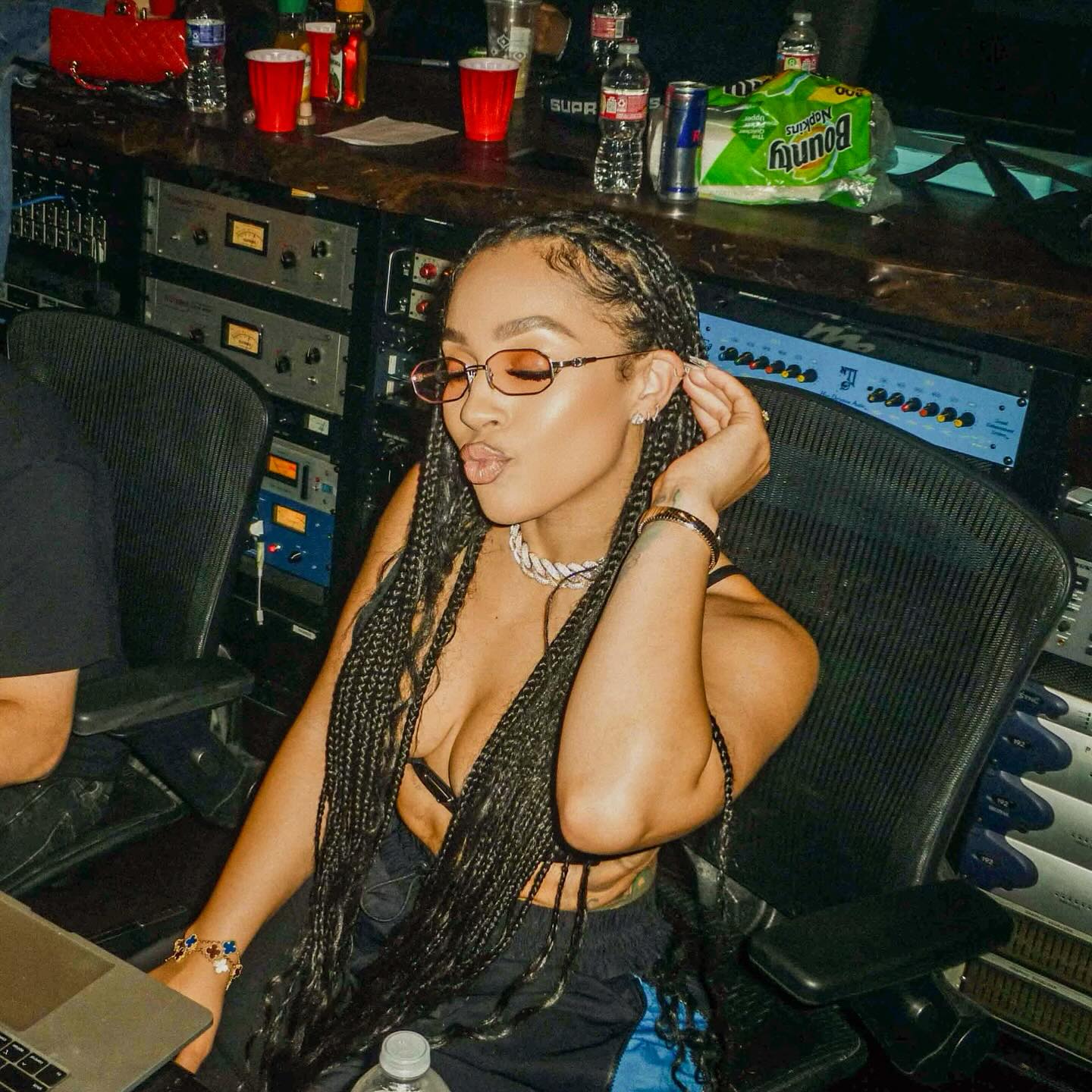 Joie Chavis in a poised dance stance, conveying strength, focus, and grace.