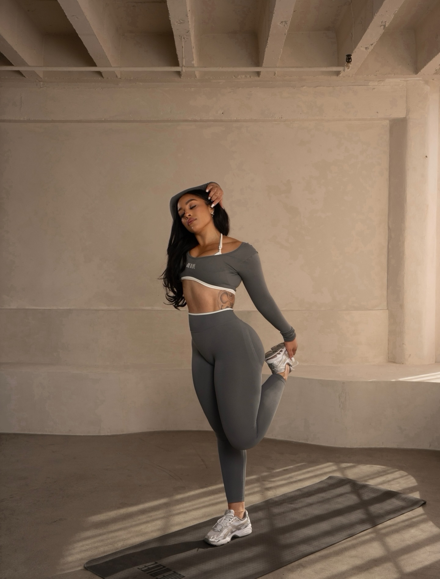 Joie Chavis in a poised dance stance, conveying strength, focus, and grace.