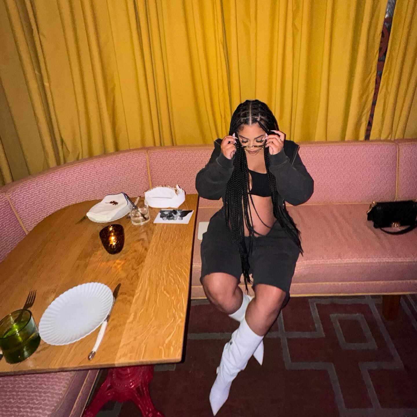 Joie Chavis in a poised dance stance, conveying strength, focus, and grace.