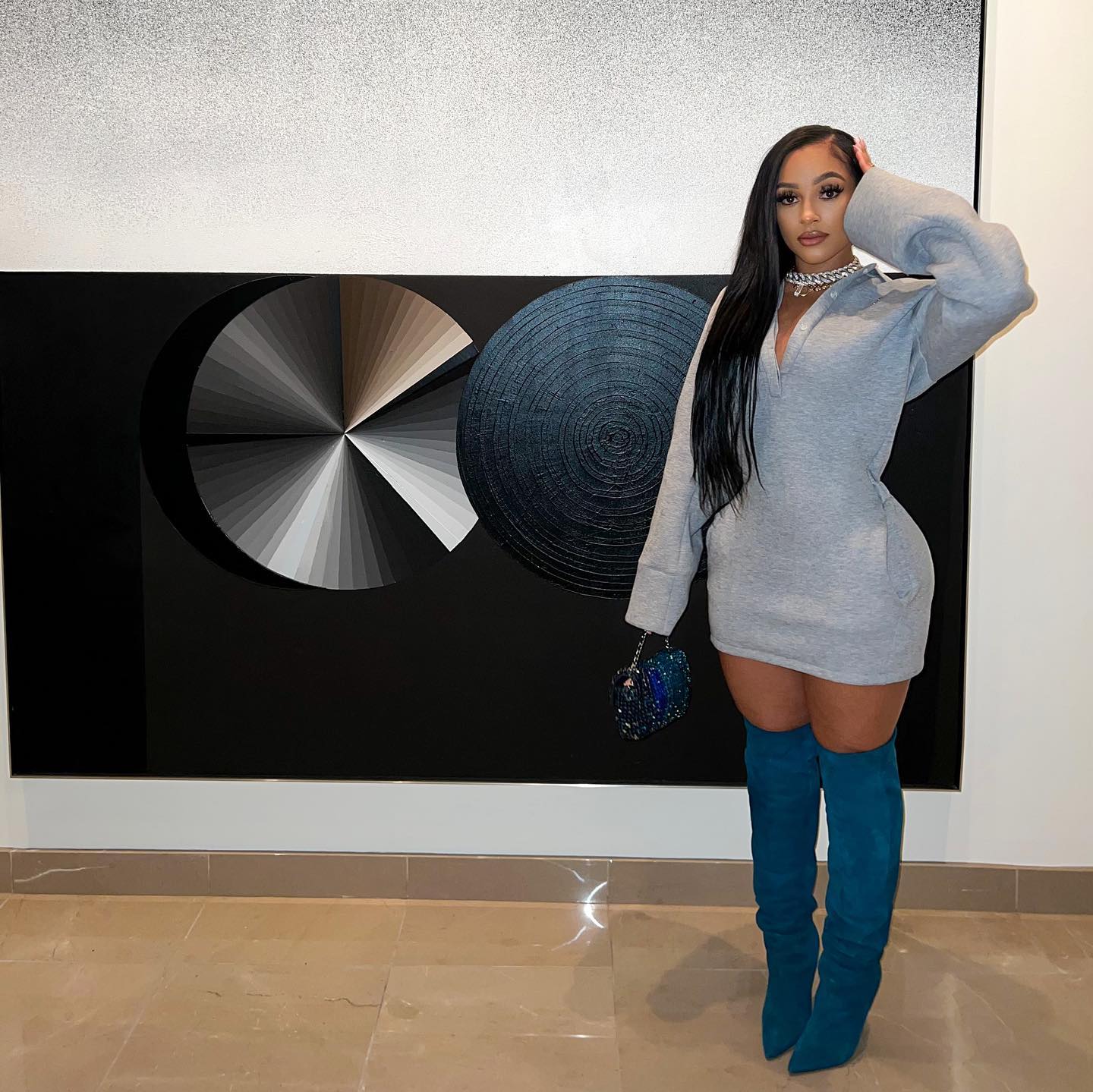 Joie Chavis in a poised dance stance, conveying strength, focus, and grace.