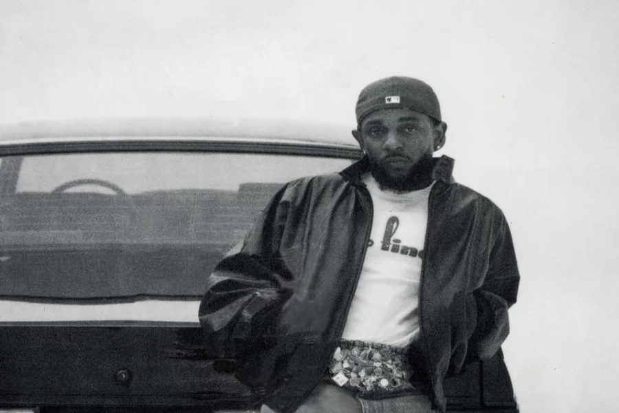 Kendrick Lamar performing on stage with powerful presence despite his smaller stature