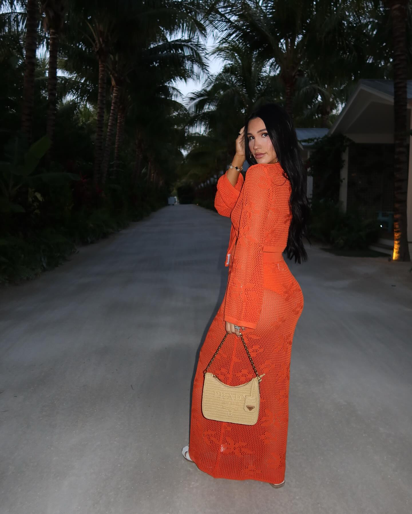 Krystiana Tiana smiling with her family in a cozy home setting, capturing the warm and relatable atmosphere that defines her content