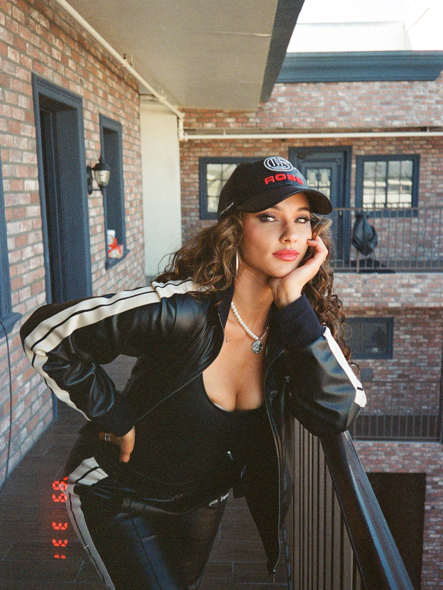 Lauren Wood in neutral athletic wear against a clean studio backdrop, reflecting fitness focus and entrepreneurial poise