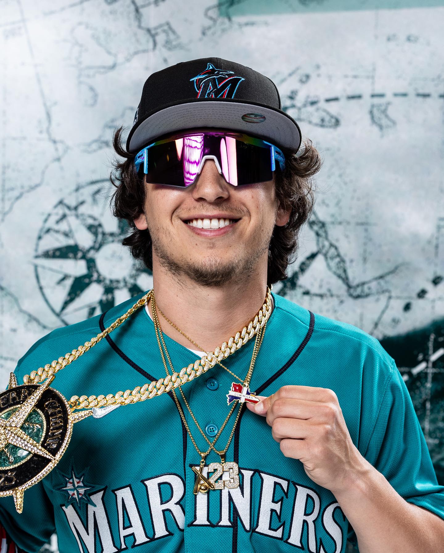 Marcello Hernandez performing a high-energy sketch on stage, highlighting his expressive movement and confident presence.