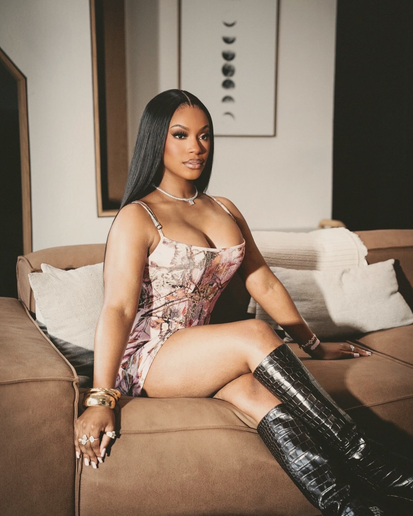 Monaleo performing on stage, delivering an energetic rap set with confident presence