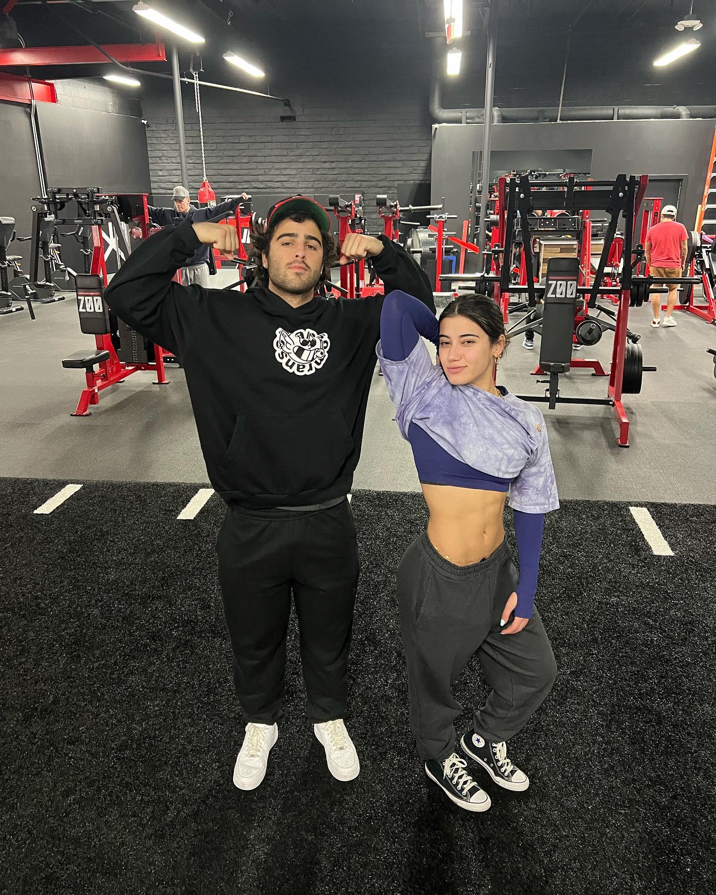 Nick Nayersina filming a vlog outdoors with a handheld camera