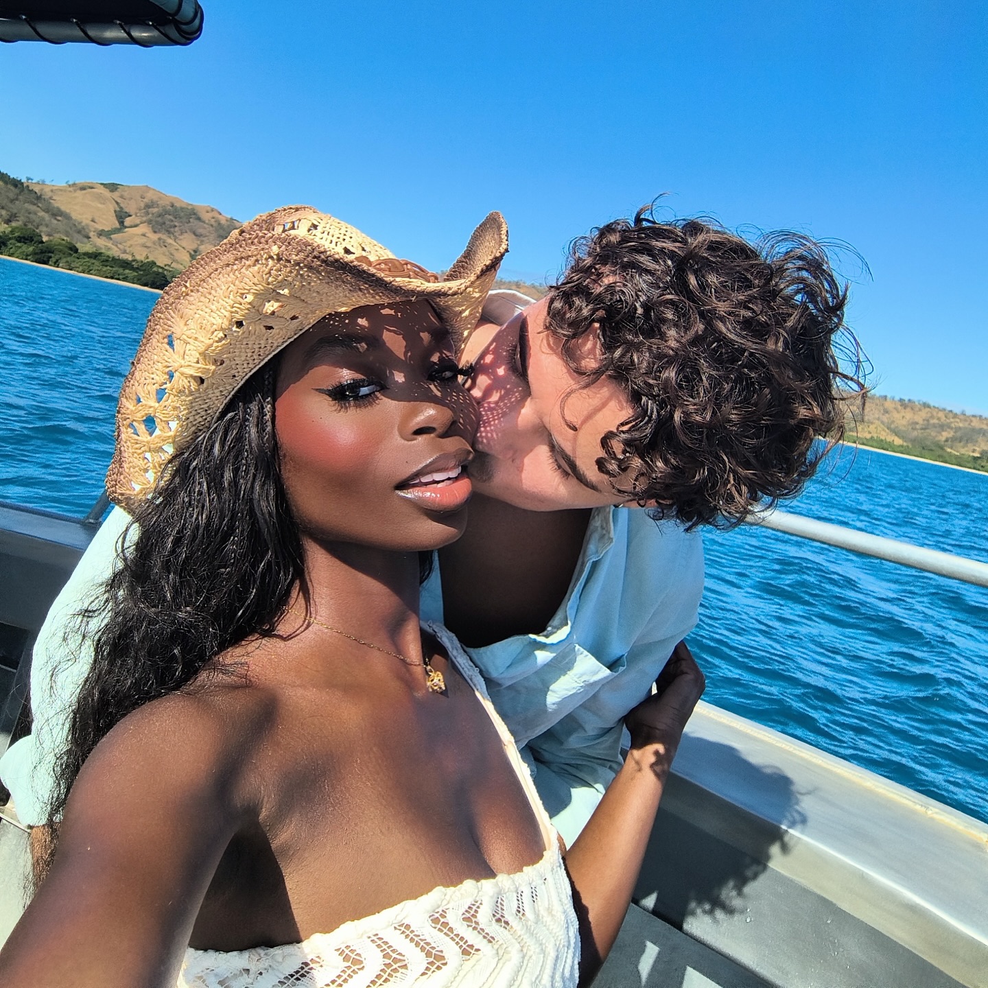 Olandria Carthen poses with a confident smile, reflecting her Alabama roots and polished style.