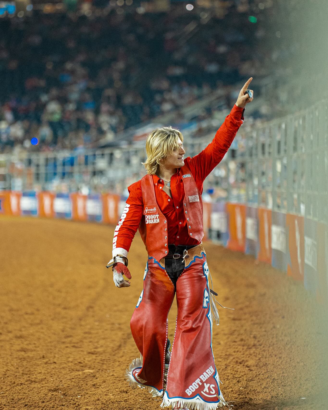 Rocker Steiner rides a bareback bronc, legs driving in rhythm as the horse kicks in midair, capturing the power and balance of modern rodeo.
