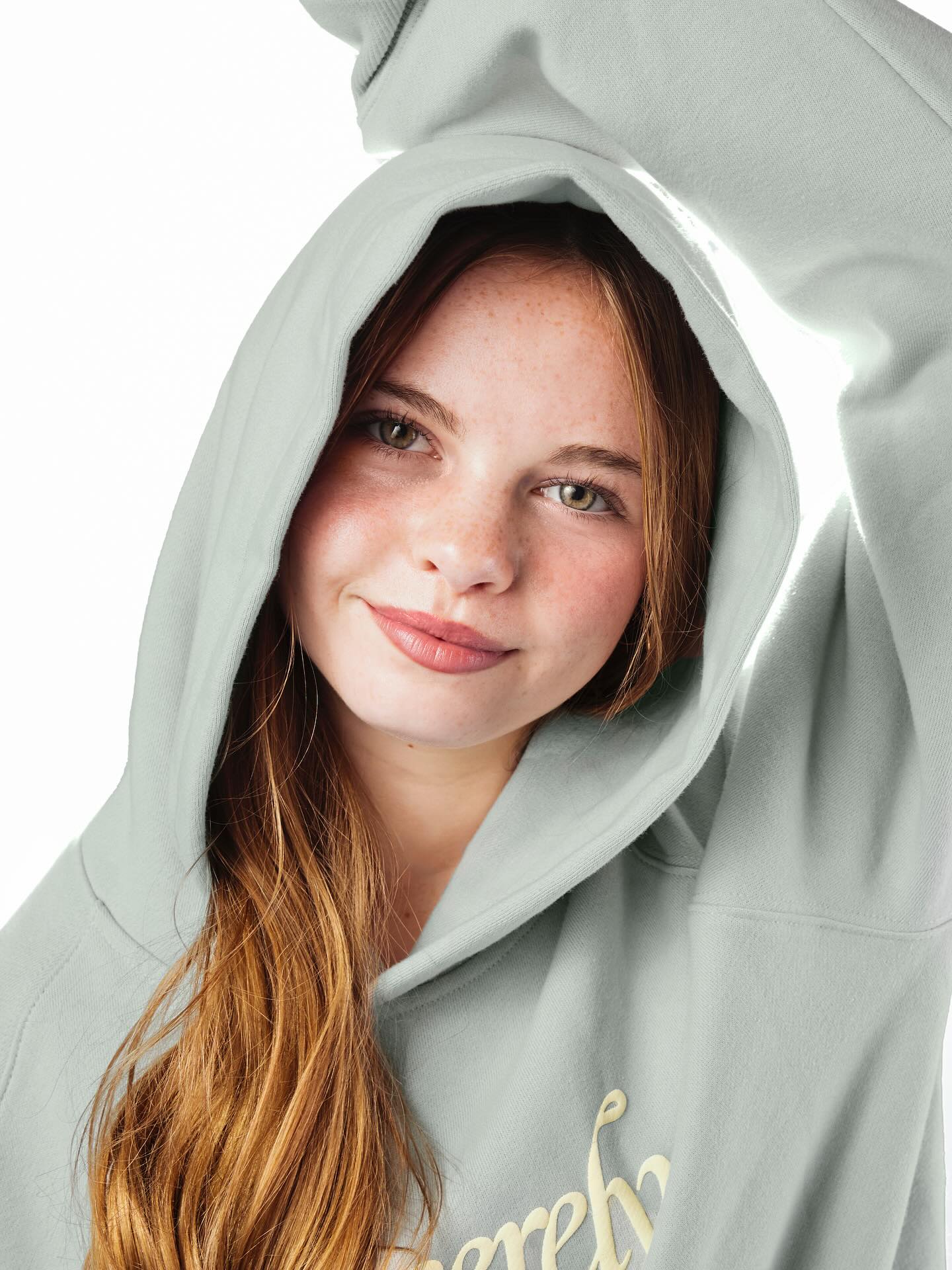 Salish Matter smiling during a casual outdoor moment, reflecting her upbeat personality and youthful confidence