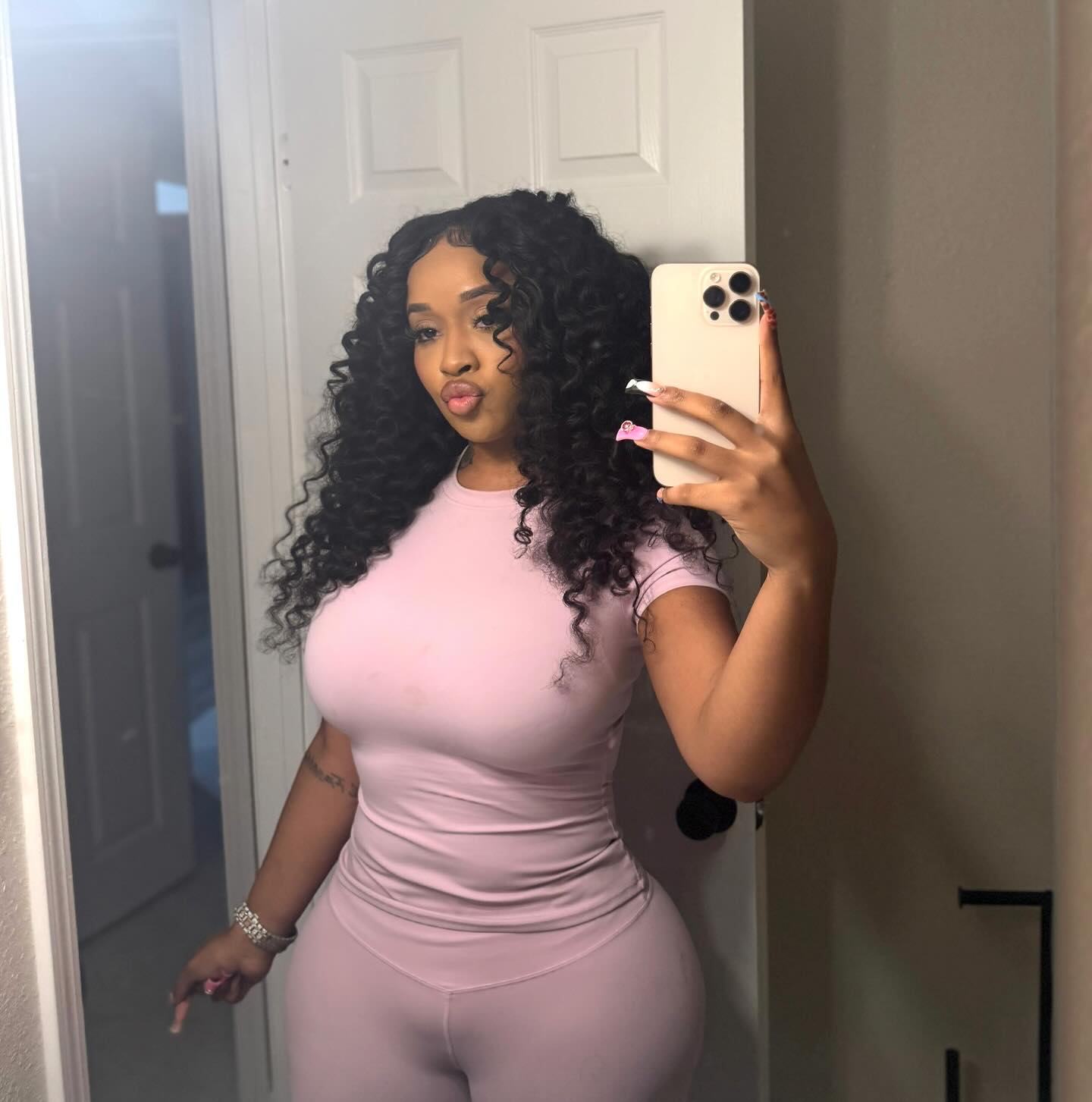 Stunna Girl performing with a confident stance and bold styling that reflects her Sacramento roots