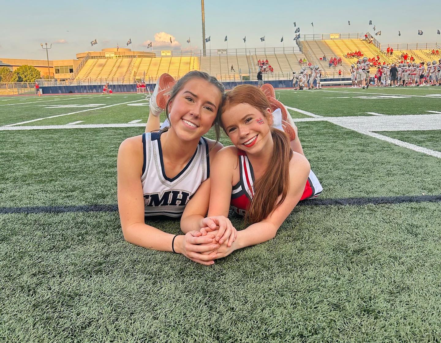 Teen creator Harper Zilmer filming a casual GRWM style video in a well lit bedroom, conveying confidence and authenticity.