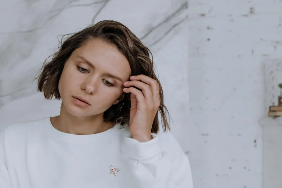 Collarbone-length lob haircut with soft, textured ends and natural movement