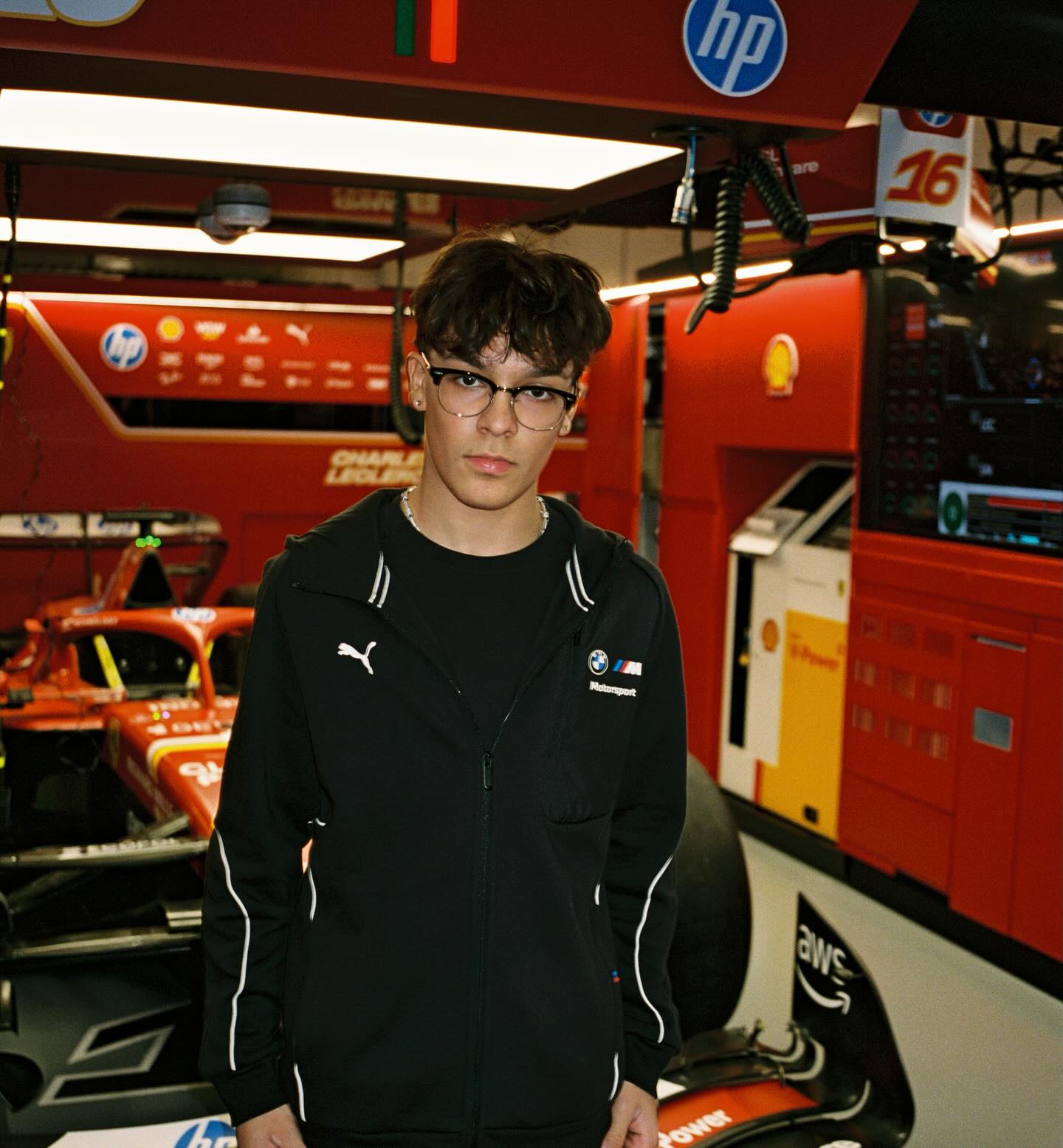 Trey Makai performing a contemporary dance move with focused expression and clean lines against an urban backdrop