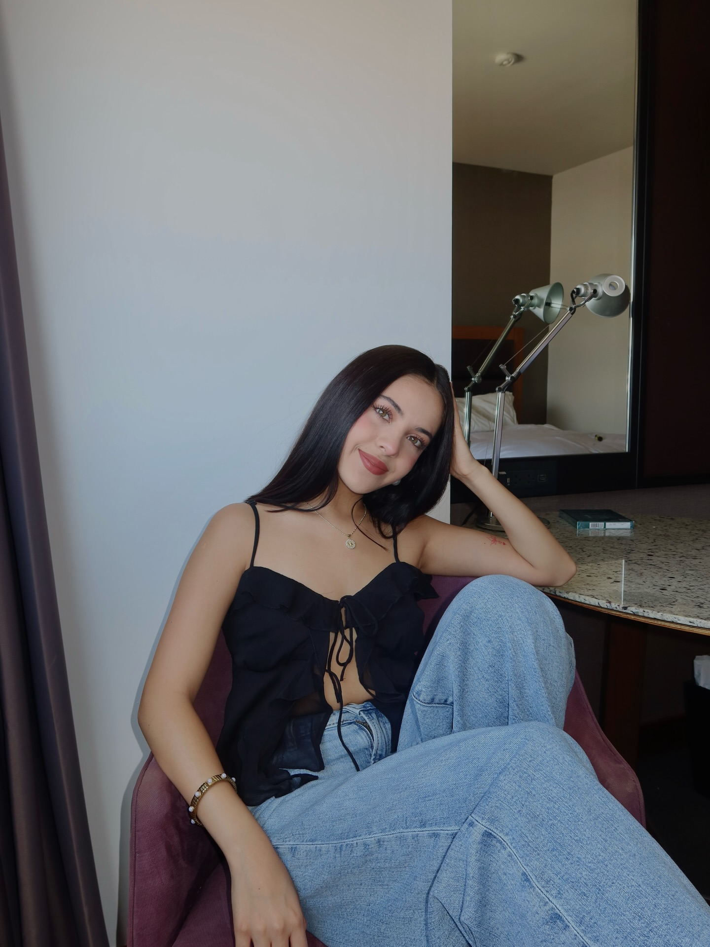 Young Mexican actress Cassandra Iturralde during a television set break, looking confident and focused