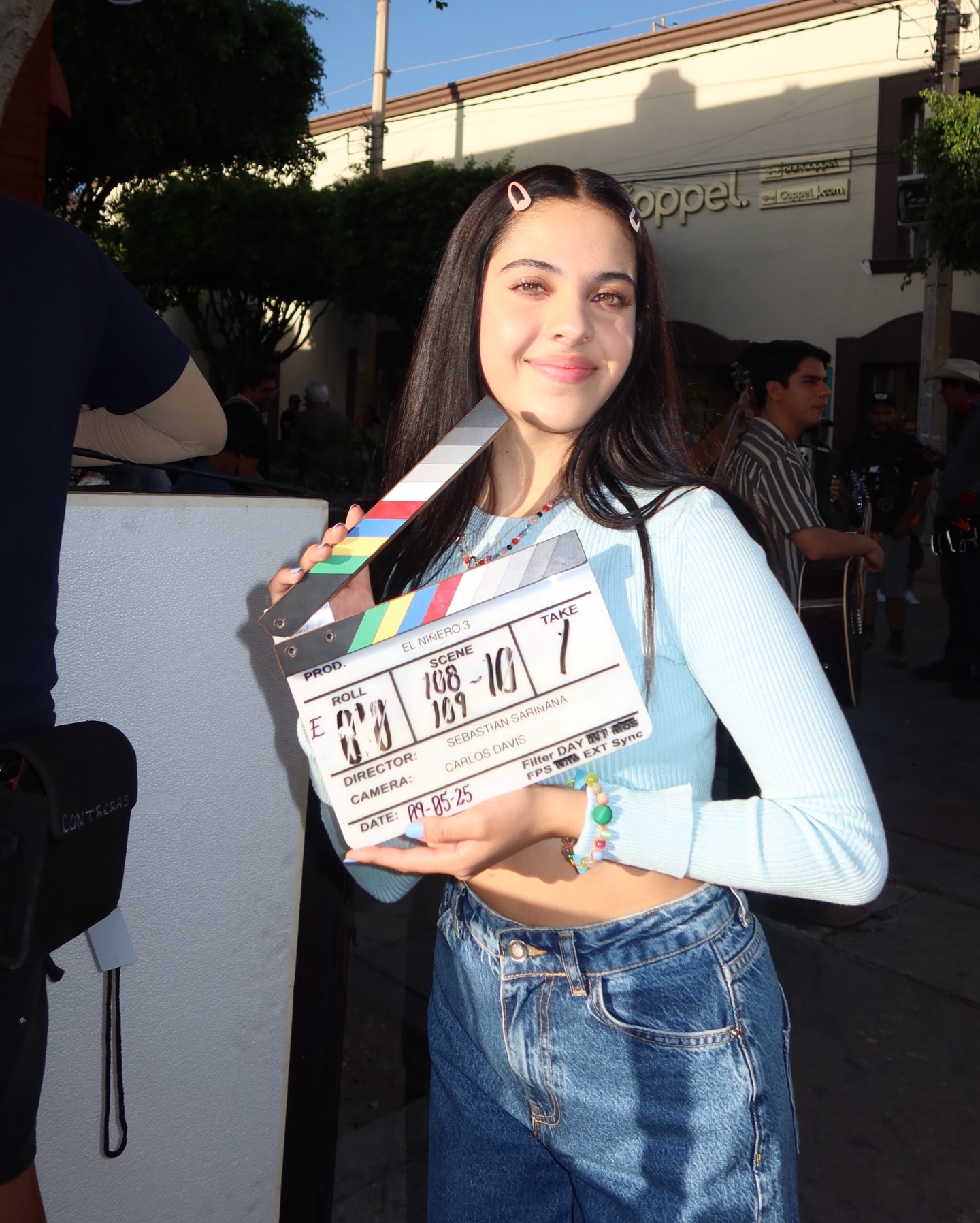 Young Mexican actress Cassandra Iturralde during a television set break, looking confident and focused